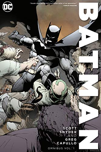 Batman stands over struggling figures in a dramatic comic book cover.