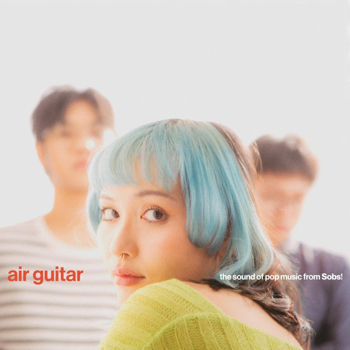 Album cover for “Air Guitar” featuring a woman with blue hair.