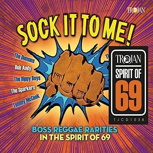 CD cover: fist breaking through a starburst with "Sock It To Me!" text.