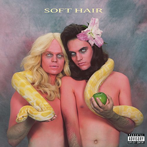 Two shirtless people with pale makeup and a yellow snake against a mottled background.