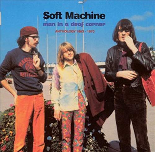 Album cover: three people with 1960s fashion, standing outdoors.