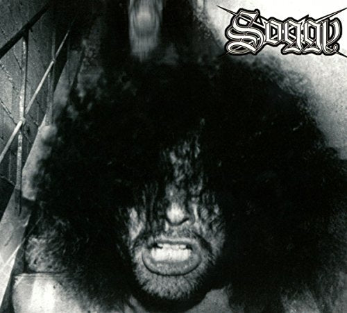 Black and white album cover featuring a distorted, screaming face.