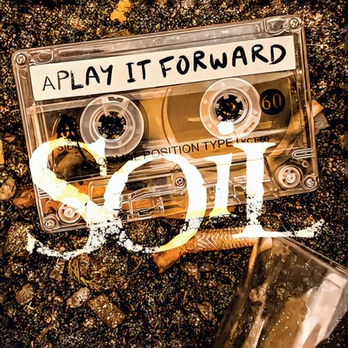 Album cover for "Soil - Play It Forward" featuring a cassette tape.