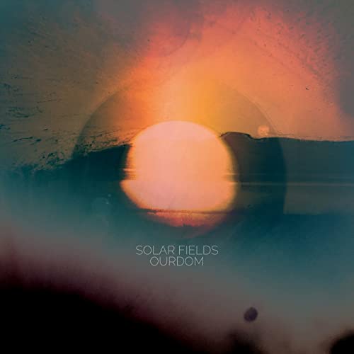 CD cover for Solar Fields’ “Ourdom” with a sun-like orb and hazy colors.