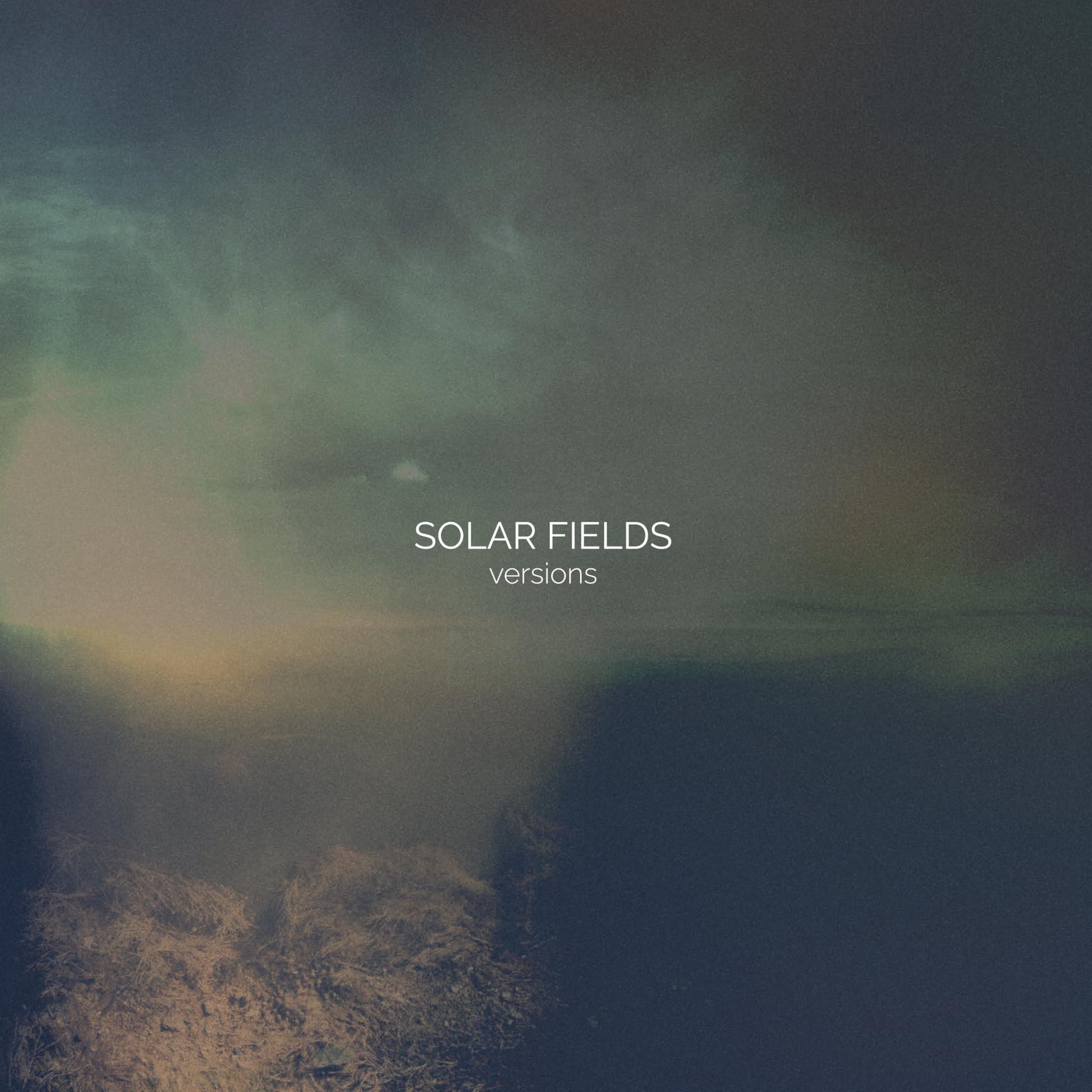 CD cover for “Solar Fields - Versions” with a blurred, atmospheric landscape.