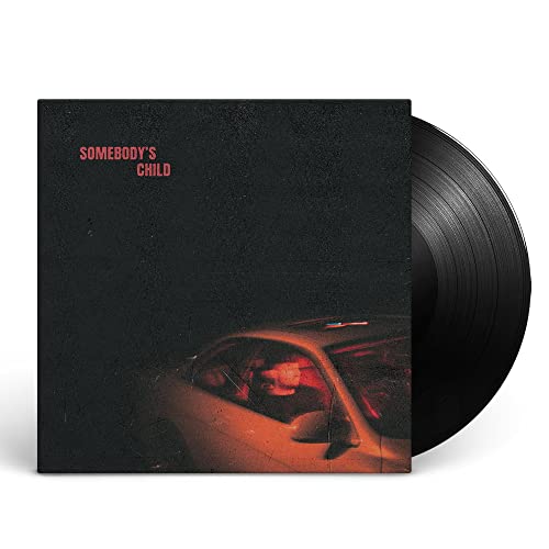 Vinyl record with album cover featuring a car and red text.