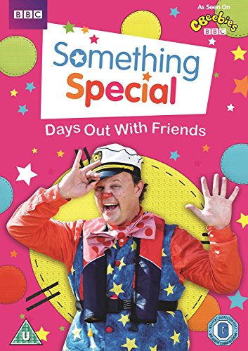 "DVD cover featuring a man in a star-patterned outfit against a pink background."