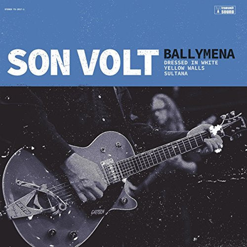Vinyl album cover with a black-and-white photo of a person playing a guitar.