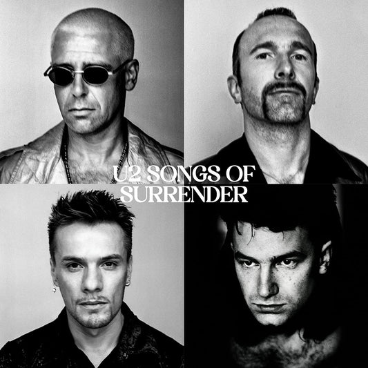 "Black and white album cover featuring four close-up portraits of U2 band members."