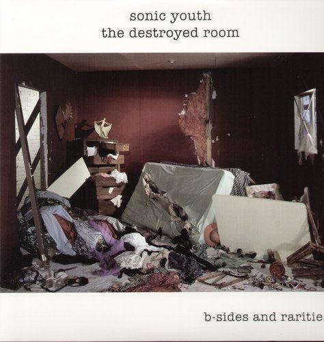 Sonic Youth album cover: a cluttered, damaged room with debris.
