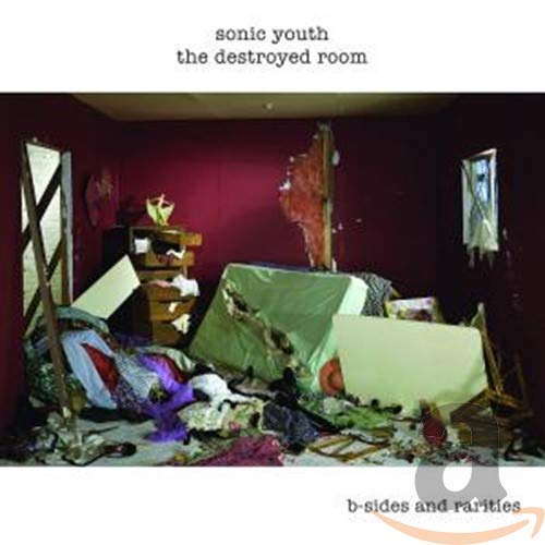 CD cover for Sonic Youth’s “The Destroyed Room” depicting a heavily damaged room.