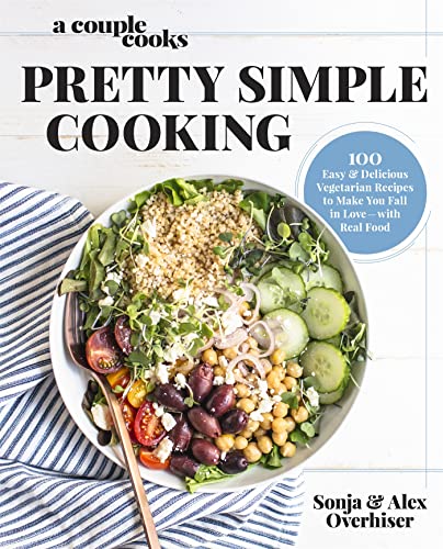 Cookbook cover with salad image and bold title "Pretty Simple Cooking.