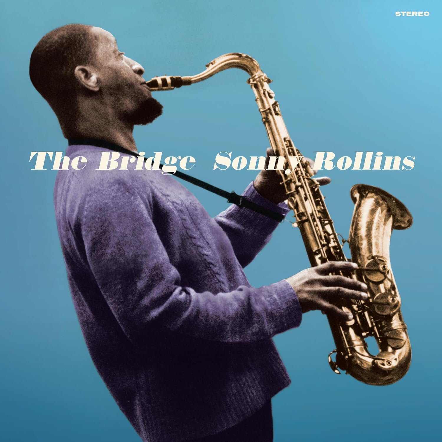 Sonny Rollins in a purple sweater playing a saxophone against a blue background.