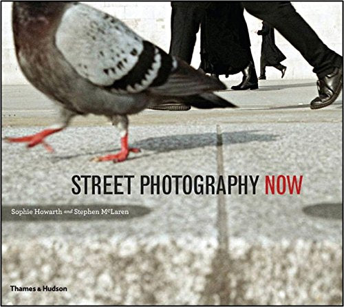 Book cover featuring a pigeon walking on pavement with people's legs in the background.