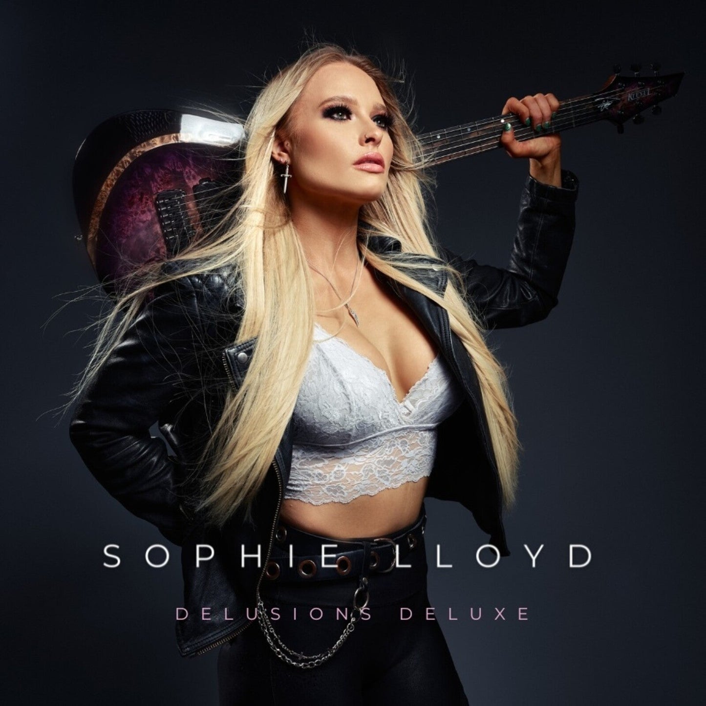 Sophie Lloyd album cover: blonde woman with guitar, dark background.