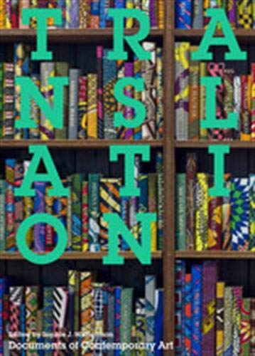Book cover with large, colorful letters spelling “TRANSLATION” against a bookshelf.