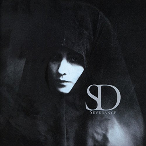 Dark, moody album cover featuring a person in a hooded cloak with SD logo.