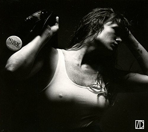 Black and white photo of a person with long hair in distress.