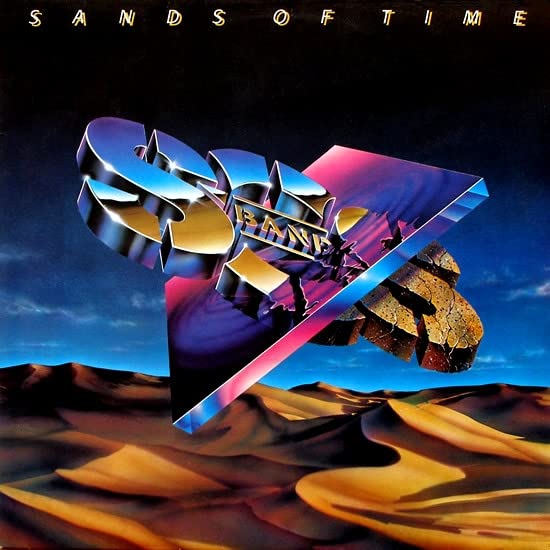 Album cover for S.o.s. Band’s “Sands Of Time” with stylized text and desert scene.