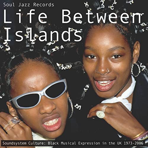 CD cover featuring two smiling Black women with textured hair and jewelry.