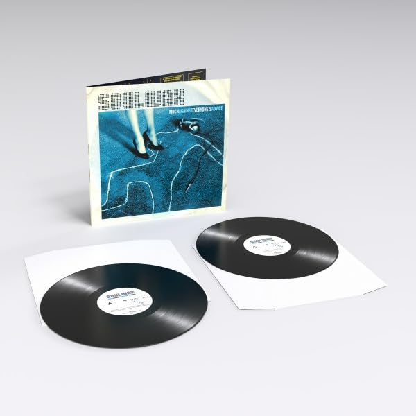Soulwax album cover and two vinyl records with white sleeves.