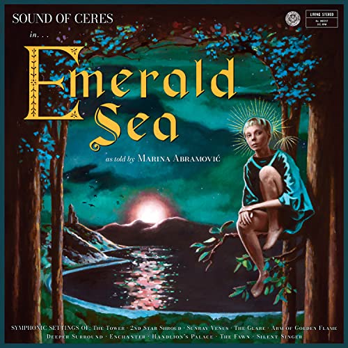 Vinyl cover art showing a child sitting in a tree overlooking a glowing sea.
