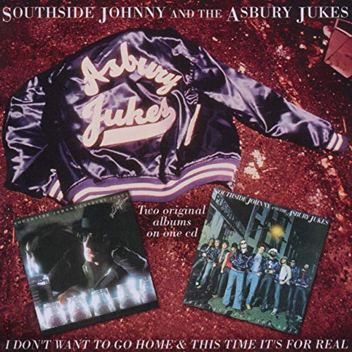 An Asbury Jukes jacket above two album covers on a dark red textured background.