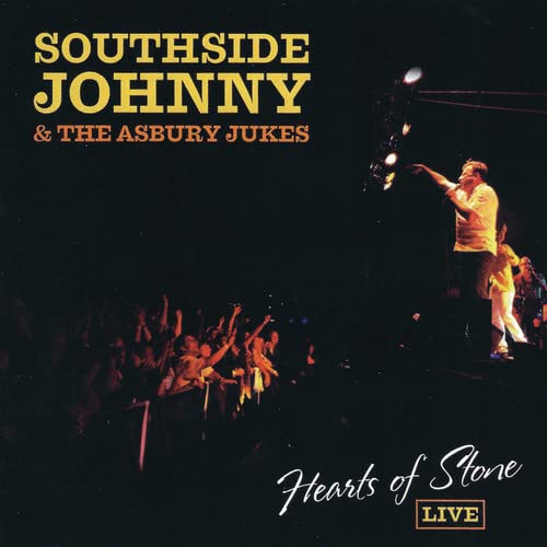 CD cover: Southside Johnny performing live to a crowded audience.