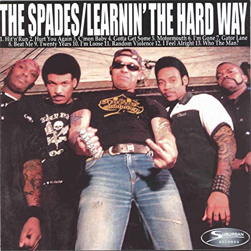 Album cover for "The Spades - Learnin' The Hard Way" featuring five men.
