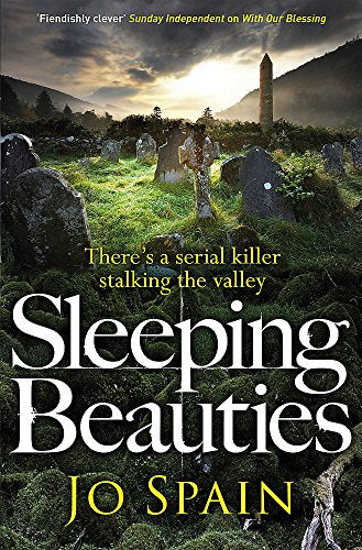 Book cover: graveyard scene with detective, title “Sleeping Beauties” by Jo Spain.