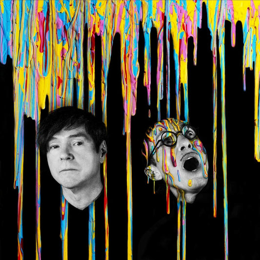 Album cover with two black and white portraits and colorful dripping paint on a black background.