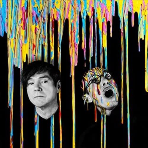 Two men against a black background with colorful paint dripping down from the top.