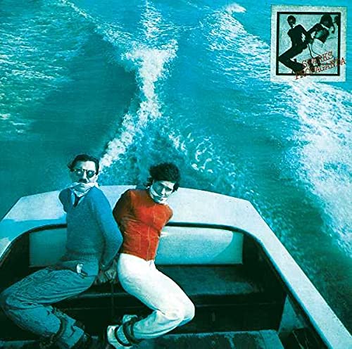 Sparks album cover: two men on a boat in blue water.
