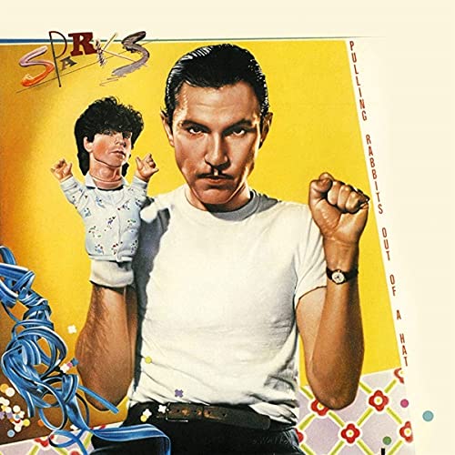 Album cover: Man with a miniature version of himself and blue swirls.
