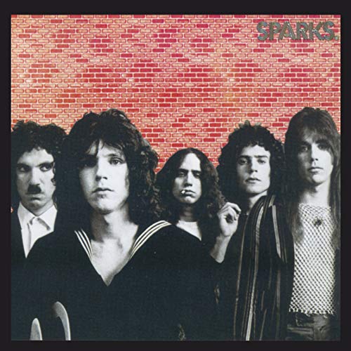 Sparks album cover featuring four men with long hair in front of a brick wall.