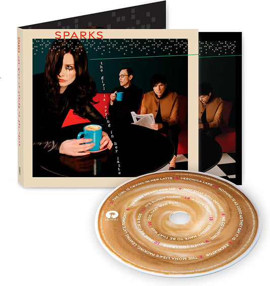 CD case with a photo of three people and a coffee cup CD.