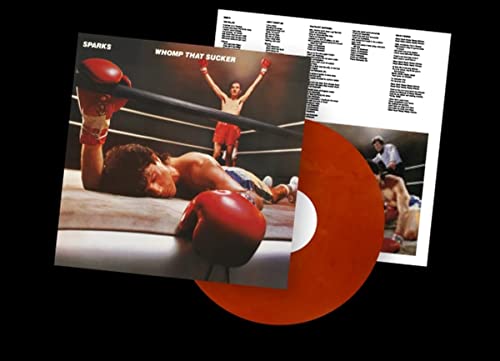 Sparks Whomp That Sucker vinyl record cover, inner sleeve, and orange marbled vinyl disc.