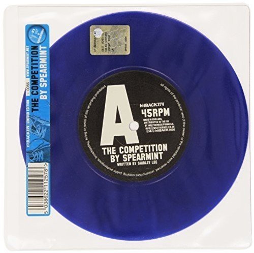 Blue vinyl record in a plastic sleeve with a side label and barcode sticker.
