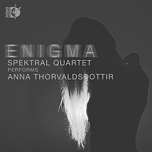 CD cover: dark silhouette of a woman with flowing hair, text "ENIGMA".