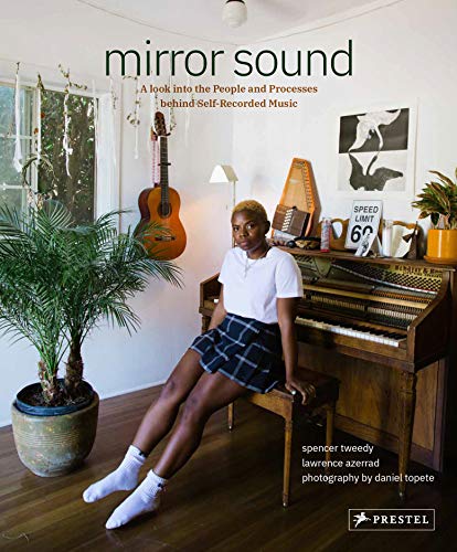 Book cover featuring a young person with a piano and musical instruments.