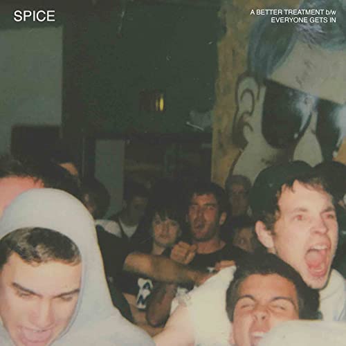 Vinyl record cover featuring a blurred crowd of people with expressive faces.