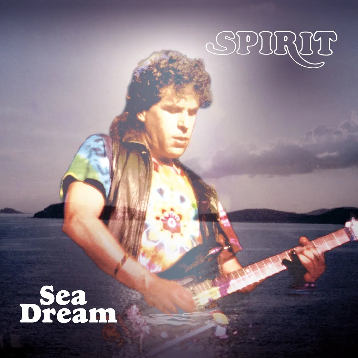 Album cover for "Sea Dream" by Spirit, featuring a guitarist by the sea.