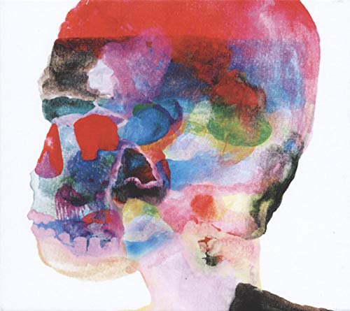 A watercolor-style profile illustration of a human skull filled with colorful abstract shapes.