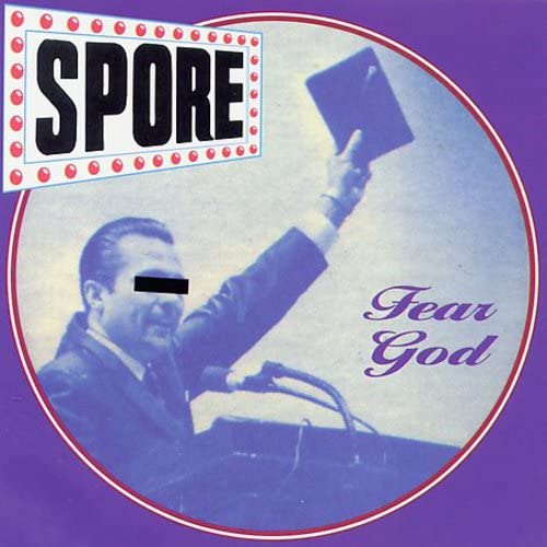 CD cover for Spore’s “Fear God” with a blurred, obscured figure.