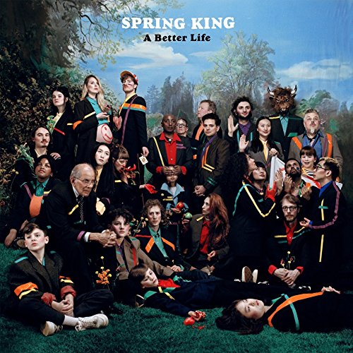 "Album cover with a diverse group of people in black robes outdoors."