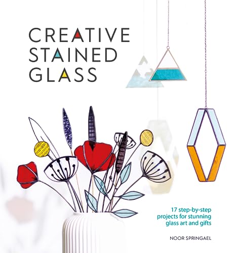 Book cover with illustrated stained glass designs and floral elements.