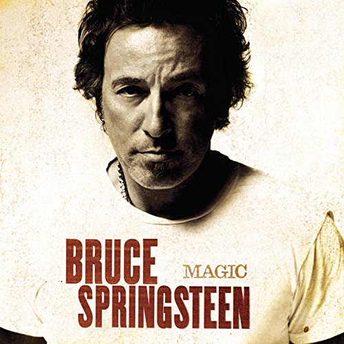 Bruce Springsteen album cover, "Magic," with a textured, sepia-toned portrait.
