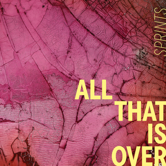 Vinyl record cover for SPRINTS' "All That Is Over" with textured pink background.