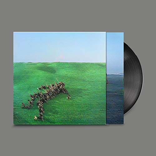Vinyl record with cover art of a bright green field and figures.