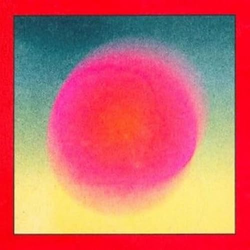 Vinyl record cover with a blurred, colorful pink and yellow circle.
